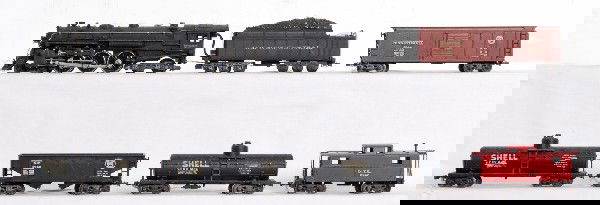 Lionel 003 w/003T & 0044, 0045, 0075, 0046, 0047: Prewar OO gauge Lionel No. 003 Hudson steam locomotive with 003T New York Central tender without whistle. Tender has some light surface rust on draw bar. Train should clean to look nicer C6. Pennsylva