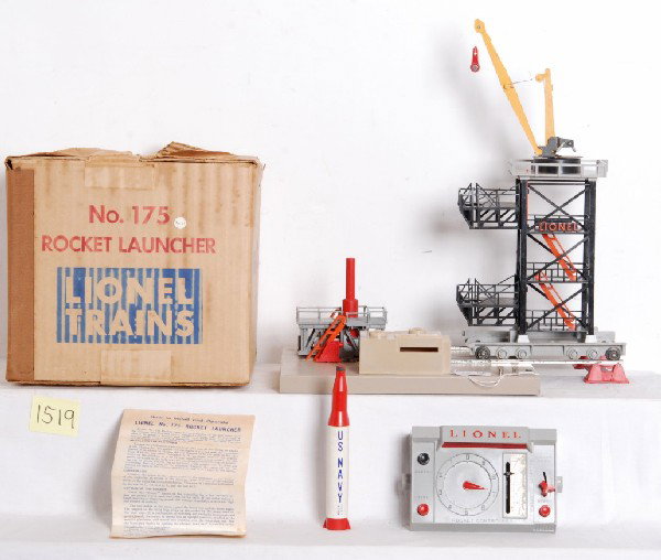 Lionel No. 175 rocket launcher in OB with inserts: Postwar O gauge Lionel No. 175 rocket launcher in original box with controller, launch pad, mobile tower with derrick, rocket (cracked). One hand rail looks broken/cracked but is actually a molding fl
