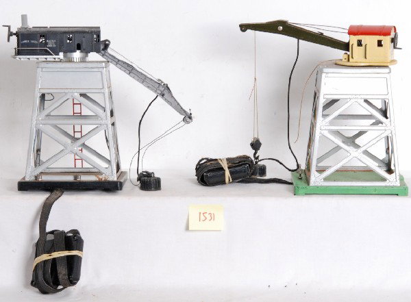 Lionel Nos. 165 and 182 operating magnetic cranes: Lionel O gauge prewar No. 165 magnetic crane and postwar No. 182 magnetic crane. Both have controllers that will need to be rewired. Please view the photographs for the best description and as to the 
