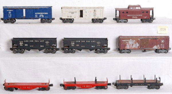 Large lot of Lionel postwar O gauge trains: Large lot of postwar O gauge Lionel trains. Freight and passenger cars. Lot is composed of parts / restoration type pieces. 6460 operating crane, 2422 Chatham Pullman, 6417 Pennsylvania N5 porthole ca