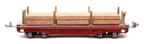 Lionel Prewar 811 Maroon Flatcar w/Wood Load: Lionel prewar O gauge 811 maroon flatcar with wood load, brass stakes, brake wheels and nickel journals, C7-8.