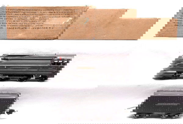 Lionel 238 Pennsylvania Loco w/265W Tender: Lionel prewar O gauge 238E Pennsylvania gunmetal 4-4-2 loco in OB and original cardboard insert with a 265W tender, both have nickel trim. The tender also has nickel journals. The loco is C7 and the t