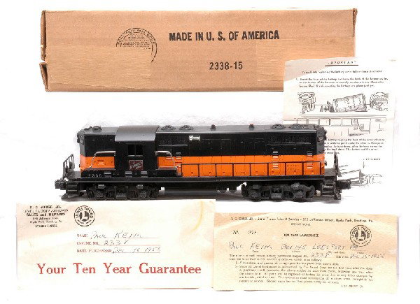 Lionel 2338 Milwaukee Road GP-7 Diesel Loco OB: Lionel postwar 2338 Milwaukee Road GP-7 diesel loco with a very unusual service station guarantee and instruction sheet in OB. The guarantee is in the original envelope. Both the certificate and envel