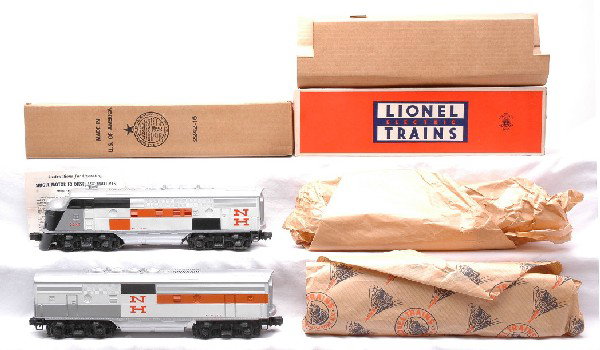 Lionel 2242P/2242C New Haven F3 AB Units MIB: Lionel postwar 2242P/2242C New Haven F3 AB units in OBs with original wraps and instruction sheet. The 2242C has an original cardboard insert. The diesels have never been run. The silver is very brigh