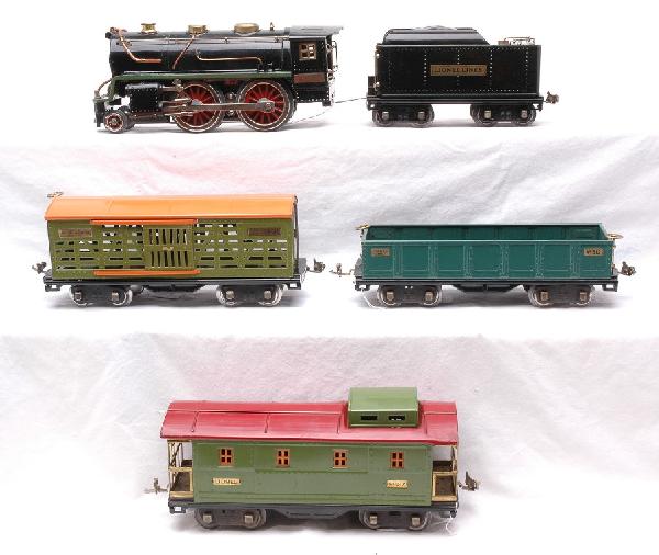 Lionel Freight Set no. 386 384E 384T 512 513 517: Lionel prewar standard gauge freight set no. 386 containing; 384E black 2-4-0 steam loco, 384T tender, 512 peacock gondola, 513 pea green cattle car with an orange roof and a 517 pea green caboose wit