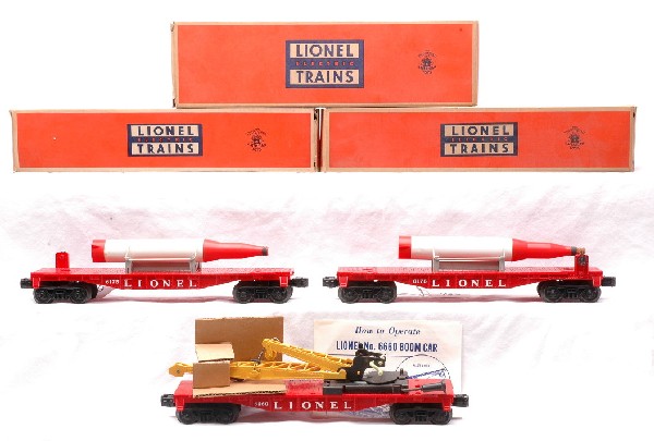 Lionel 6660 Crane MIB two 6175 Rocket Cars LN OB: Lionel postwar 6660 boom crane car with original cardboard insert and instruction sheet and two 6175 rocket cars all in OBs. The 6660 has never been run, C9-10. The two 6175 rocket cars are C8. The OB