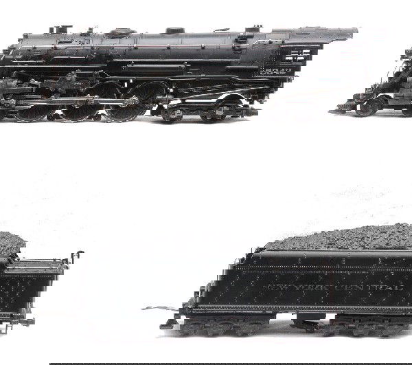 Lionel OO Ga 001 001W Hudson 1938 Version LN: Lionel prewar OO gauge 001 Hudson steam loco and 001W whistle tender. This is the 1938 version super-detailed three rail with miniature draw bar pin and chain. The loco is C8. The lettering on the ten