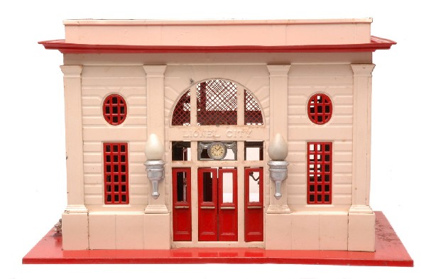 Lionel 115 Station w/Vermilion Base Cream Walls: Lionel prewar standard gauge 115 station with vermilion base, roof, skylight, window inserts and doors, ivory walls and aluminum painted light fixtures. The skylight has been replaced. The station has