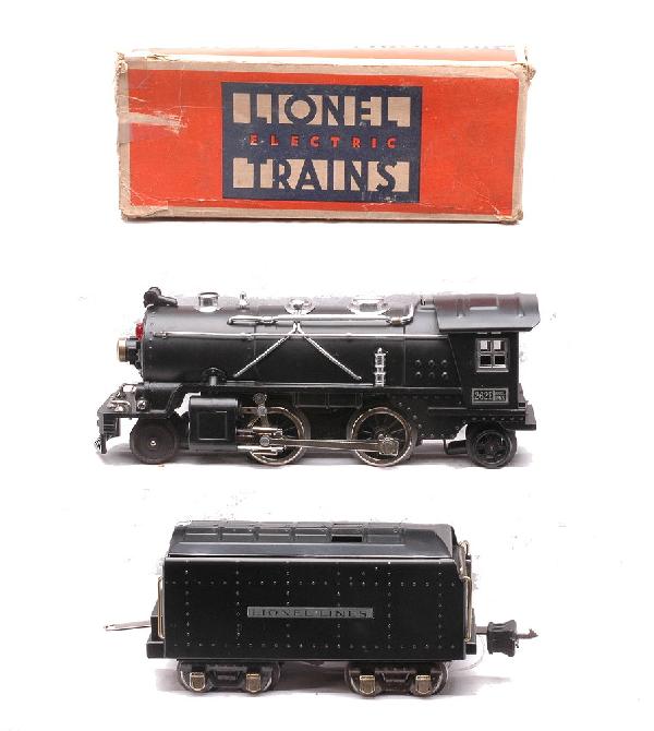 Lionel 262E Black Loco 265W Tender w/OB: Lionel prewar O gauge 262E black 2-4-2 steam loco and a 265W tender in worn OB. The loco and tender have nickel trim and the tender has nickel journals. Loco and tender have been professionally restor