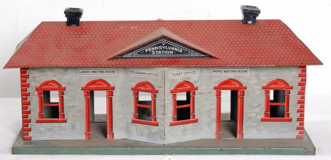 Bing Pennsylvania Station tinplate building: Prewar Bing Pennsylvania Station tinplate building. Base measures approximately 14 1/2 inches long, 6 3/8 inches wide and 6 3/4 inches tall at chimneys. Station is illuminated. Station should clean an