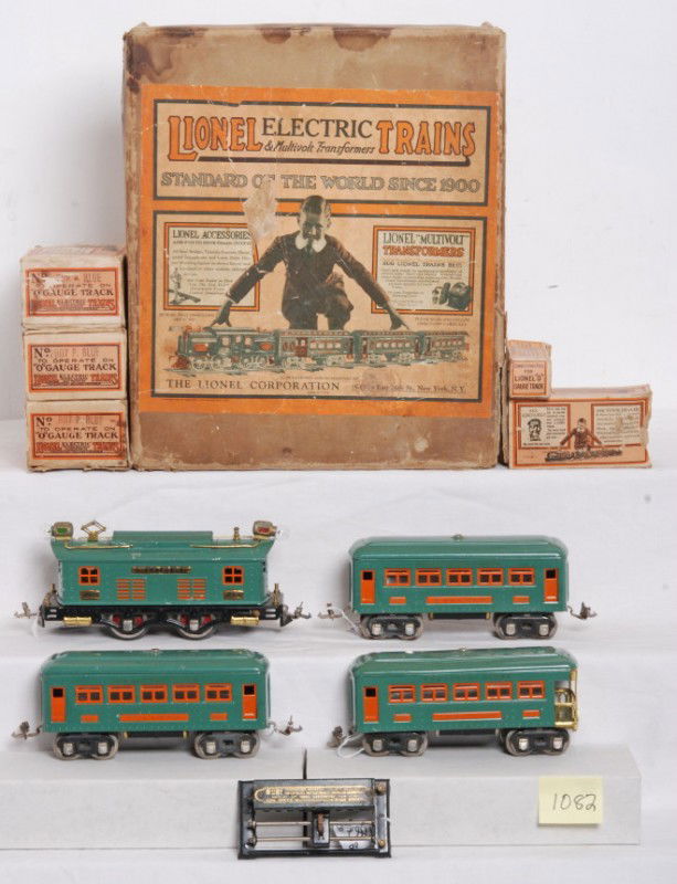 Boxed Lionel No. 296 P. Blue passenger set w/253: Prewar O gauge Lionel Outfit No. 296 in original boxes, 253 boxcab electric locomotive, two 607 Pullman coaches and a 608 observation. Trains are all P. Blue with nickel trim. Also present are boxed N