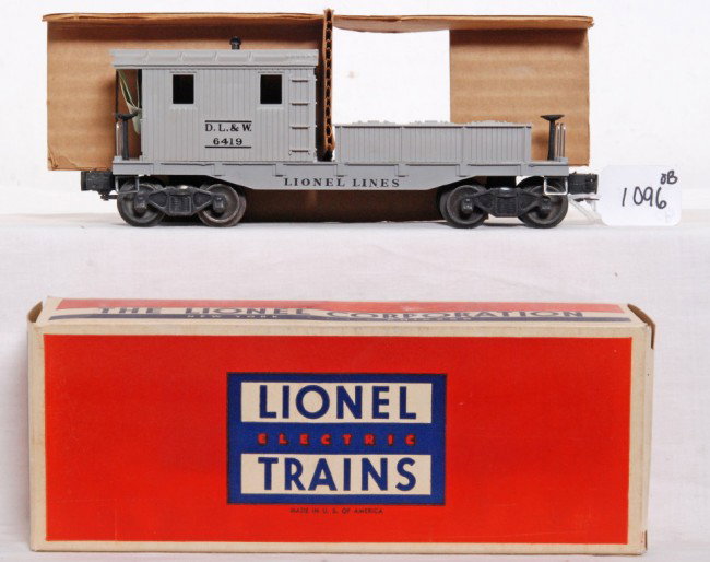 Lionel No. 6419-50 wrecking car in OB w/insert: Postwar O gauge Lionel No. 6419-50 wrecking car or Delaware, Lackawanna and Western work caboose in original box with insert and inspection slip. Car is C10. From the right angle and at first glance b