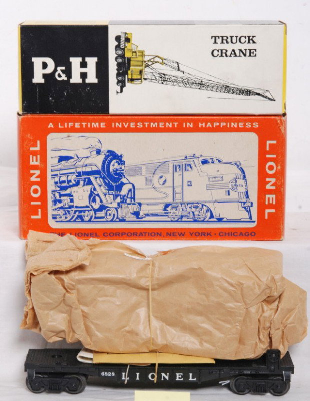 Lionel No. 6828-100 in OB in M.C. light yellow: Postwar O gauge No. 6828-100 Harnischfeger truck crane car kit in original box in original Master Carton/Master box, light yellow variation. Kit is in original wrapping material and has no broken or m
