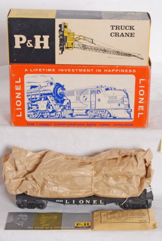 Lionel No. 6828 and 6828-100 all in OB Mint: Postwar O gauge Lionel No. 6828 Harnischfeger power shovel car in original box with all original components and literature in 6828-100 OB, C9-10.