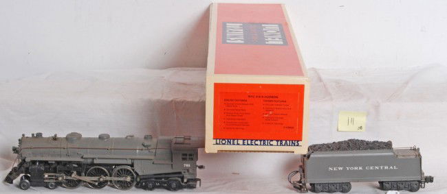 Lionel 18002 New York Central Hudson: Lionel O Gauge 18002 New York Central Hudson in OB. Loco looks high C7-8 however has light flash rust on hand rails. Loco features smoke, whistle and much more. OB shows light wear.