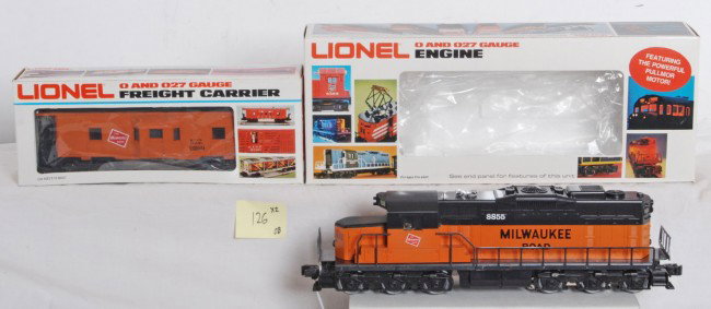Lionel Milwaukee Road 8855 SD-18 9269 caboose: Lionel modern O Gauge Milwaukee Road 8855 SD-18 and 9269 caboose in OBs. Loco comes with all instructions and paperwork. Loco looks C8+ with the exception of two very light spots of rust on the front 
