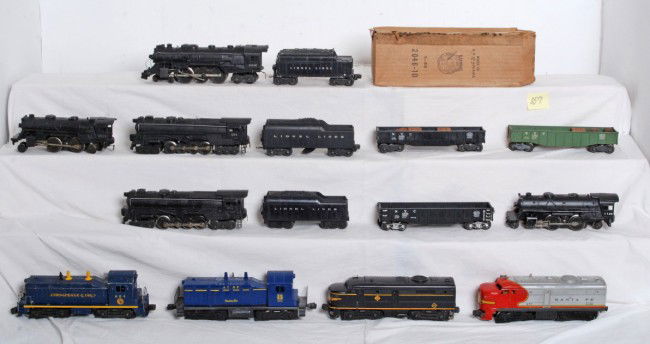 Large lot of Lionel postwar O gauge trains and mor: Postwar Lionel O gauge No. 2032P, 218P, 624, 634, 671, 2046W, 6466W, 671 w/Lionel Atomic, Lionel Lines tender, 6462, 6462, 6462, 2046 in OB, 1110, 1120. Please view the photographs for the best descri