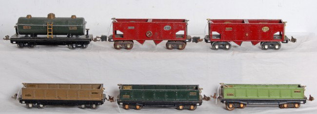Prewar Lionel 815, 812 x3, 816 x2: Prewar Lionel O gauge No. 815 tank, three 812 gondolas and two 815 hoppers. Repainting to 815, otherwise C5-6.