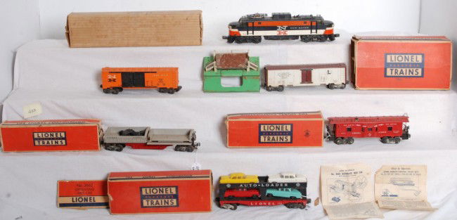 Lionel 2350 NH EP5, 3662, 3359, 6468, etc.: Lionel Postwar O Gauge 2350 New Haven EP5, 3662 operating milk car 3359 dump car, 6468 New Haven boxcar, 6414 auto loader with autos, and 6517 bay window caboose. Trains need cleaned have some worn bo