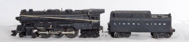 Lionel No. 2055 steam type loco and tender: Postwar O gauge Lionel No. 2055 steam type loco and tender with whistle. Loco has rust on rods and wheels and needs screw for boiler front. Tender has rust on frame. Could be cleaned/restored to look