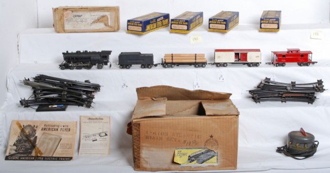 Prewar American Flyer O gauge boxed set, 565, 564.: American Flyer prewar O gauge boxed set including C6 set box. 565 loco, 564 tender, 482 lumber car, 478 boxcar and 484 caboose. Trains are nice C7. Set includes track and transformer