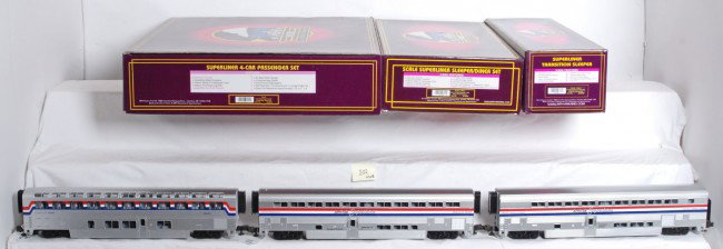MTH Amtrak 6 car Superliner set: MTH modern O Gauge Amtrak Superliners in OBs. Includes 20-6524 set missing one coach, 20-6539 sleeper and diner set, and 20-6540 transition sleeper. Cars are high C8-9 with very little run time. Large