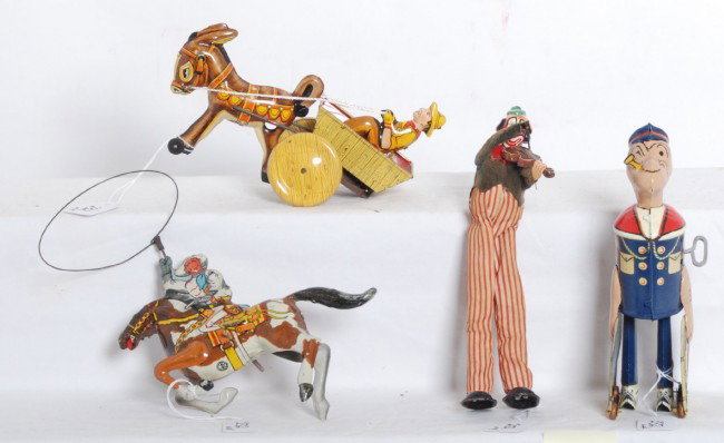 Lot of Marx tinplate windups, Popeye w/birdcage...: Nice lot of four vintage Marx (one may not be Marx) windup tinplate toys. Cowboy on bucking bronco with animated lasso. Farmer in donkey cart. Popeye with parrot/bird in cage. Tall legged clown playin
