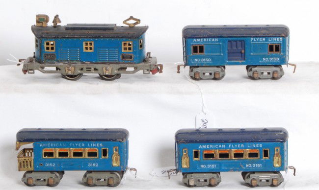 American Flyer O gauge No. 3105, 3150, 3151, 3152: Prewar narrow gauge American Flyer No 3105 boxcab electric locomotive with 3150 baggage, 3151 coach and 3152 observation. Loco has touchups repainting to frame that is onto shell, wheels have casting