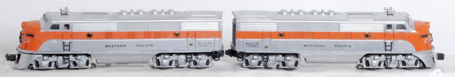 Great looking Lionel No. 2345 Western Pacific F3a: Great looking postwar O gauge Lionel No. 2345 Western Pacific EMD F3a diesel locomotives with strong silver. Dummy unit has a couple possible factory touchups to orange, otherwise looks clean and shin