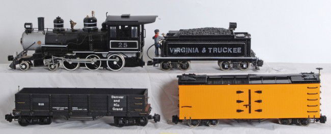 Bachmann 4-6-0 V&T plus two cars: Bachmann G Scale Virginia and Truckee 4-6-0 loco and tender. Loco does appear to have sound. Loco has some tender letters starting to peal in the corners but otherwise is C7-8. Also included are a Bac