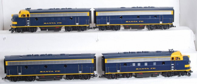 LGB Santa Fe F7 A-B-B-A with MTS and sound: LGB G Scale F7 Santa Fe A-B-A in OBs. Includes two 24574 powered A units with MTS control. Two 24584 B units with sound, one is in incorrect box. Locos are high C8-9 with very light if any run time. O
