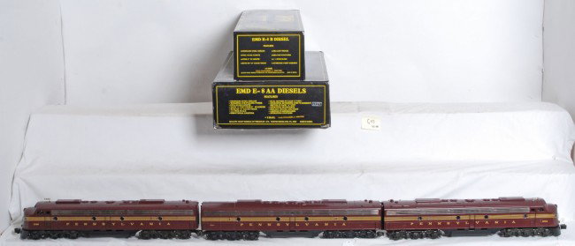 Weaver Pennsylvania E8 A-B-A: Weaver modern O Gauge Pennsylvania E8 A-B-A in OB. Locos are Tuscan five stripe version. Locos are high C8 with only a faint roller mark. Locos feature directional lighting and dual motors in each A u