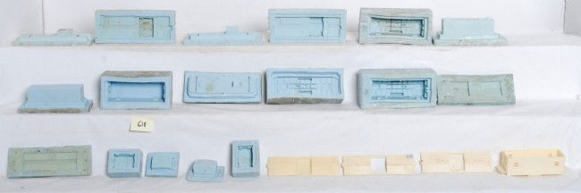 Lionel Northeast caboose prototype molds: Lionel prototype molds and hand made models for the Northeast style caboose. This style of caboose was used in many starter sets through 2000. Lot includes five master models of different style cupola
