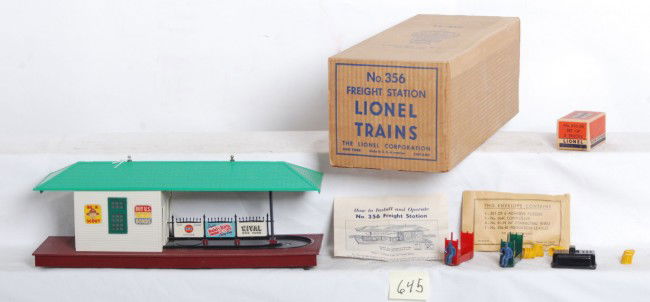 Lionel 356 freight station Lt. Green roof in OB, M: Postwar Lionel O gauge No. 356 freight station with light green roof in original box with inserts, components envelope with components, 356-35 OB with the more unusual tomato red and dark green trucks