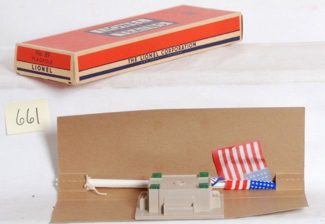 Lionel No. 89 flagpole in OB, C10 mint: Postwar Lionel O gauge No. 89 flagpole in original box with insert and 48 star flag with string, nice foam on base, C10. Another one of the many items we will sell that will not be/cannot be upgraded.
