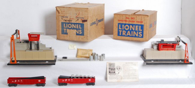 Lionel No. 342 and No. 345 loader, unloader in OB: Postwar Lionel O gauge No. 342 operating culvert loader with 6342 NYC culvert car with seven culverts. No. 345 operating culvert unloader with service stations pamphlet, factory sealed components enve