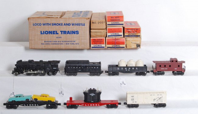 Lionel No. 1603WS steam freight set in OB: Postwar Lionel O gauge No. 2037 steam locomotive and 6026W tender with whistle, 6424 flatcar with two correct length original autos, 6112-135 canister car with three white canister, 6818 flatcar with
