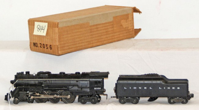 Lionel No. 2056 loco in OB and 2046W-50 tender: Postwar Lionel O gauge No. 2056 steam locomotive in original box with insert and No. 2046W-50 Lionel Lines tender with whistle. Tender has been rewired, hairline at both screws. Trains should clean an