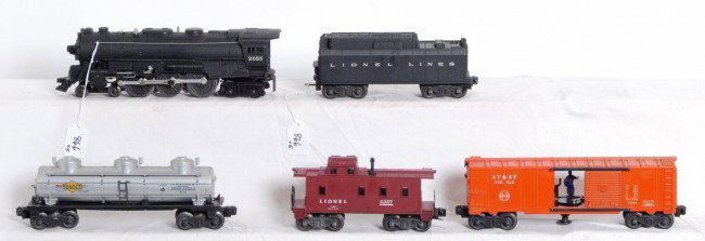 Lionel No. 2055 loco, tender, 3484-25, 6415, 6357: Postwar Lionel O gauge No. 2055 steam locomotive, unnumbered tender with whistle, 3484-25 A.T.&S.F. op. boxcar, 6415 Sunoco, 6357 caboose, C7-8.