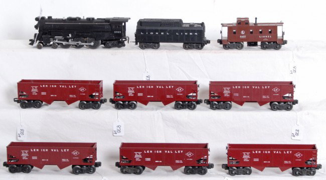 Lionel No. 2065 loco, tender, six 6456, 6457: Postwar Lionel O gauge No. 2065 steam locomotive (touched up/dinged cab corner) and unnumbered tender with whistle, six No. 6456 Lehigh Valley hoppers and 6457 caboose, C6-7.