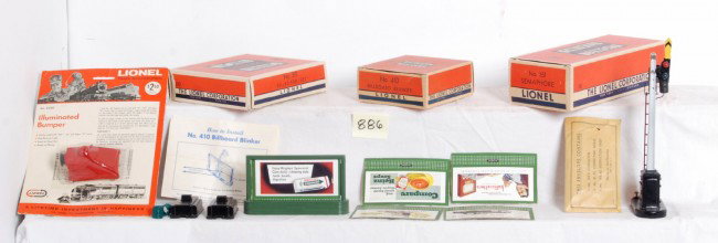 Lionel No. 310, 410, 151, B260 accessories in OB: Postwar Lionel O gauge No. 151 semaphore with 252-49 envelope with 154C and instructions sheet; No. 410 billboard blinker OB with two 364C control switches, two wire coils and 410 instructions sheet;