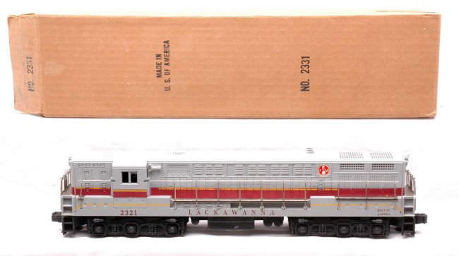 Lionel 2321 Lackawanna FM Train Master Diesel LN: Lionel postwar 2321 Lackawanna FM Train Master diesel with gray roof in reproduction box. The diesel has screw hole cracks on both ends. Diesel is C8.