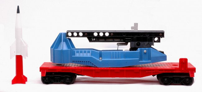 Lionel 6650 Uncataloged Rocket Launcher MINT: Rare and unusual Lionel postwar 6650 uncataloged rocket launcher flatcar with no numbers or lettering. Included with the car is a rocket. Car has been test run, C9.