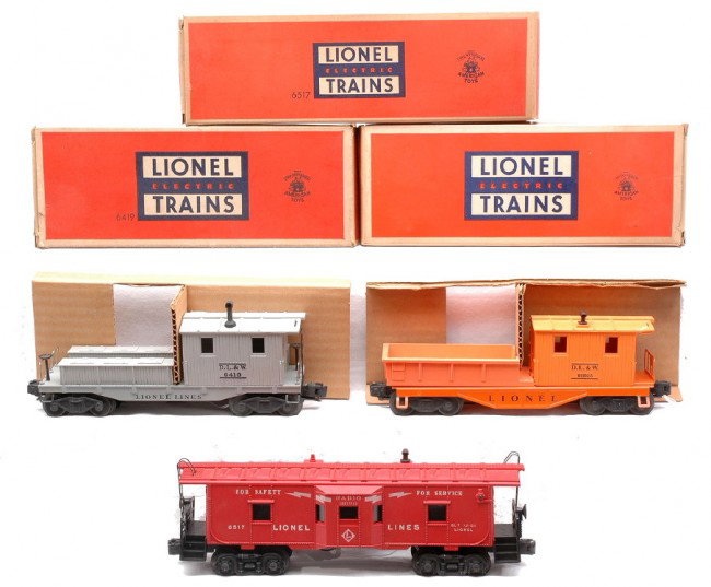Lionel 6517 6119-50 Orange 6419 Gray Cabooses: Lionel postwar 6119-25 orange D.L.& W. work caboose and 6419 gray D.L.& W. wrecking car both in OBs with original cardboard inserts. The OB for the 6119-25 is in an OB marked 6119-50. The 6419 is C8. 
