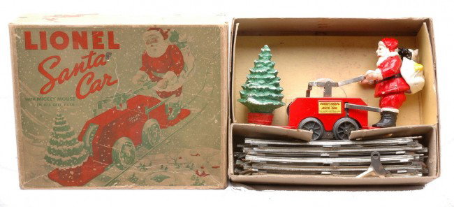 Lionel 1105 Santa & Mickey Mouse Hand Car OB: Lionel prewar O gauge 1105 Santa with Mickey Mouse wind up hand car in OB with original inserts, key and eight curve track sections. The hand car is C7-8. The OB has one split corner on the lid. Color