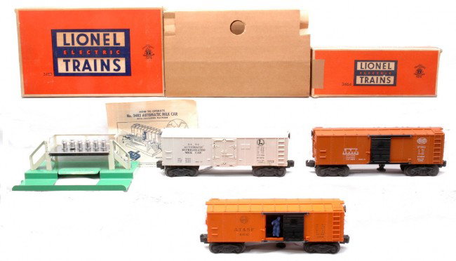 Lionel X3464 AT&SF X3464 NYC 3482 Milk Car LN: Lionel postwar X3464 A.T. & S.F. operating boxcar, X3464 New York Central System operating boxcar in OB and a 3482 operating milk car with platform, instruction sheet and six milk cans in OB. The 3482