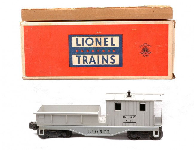 Lionel 6119-75 D.L.& W. Work Caboose LN Boxed: Lionel postwar 6119-75 D.L.& W. work caboose in OB with original cardboard insert. This is the scarce variation that has closely spaced, black rubber-stamped serif lettering on its frame. The work cab