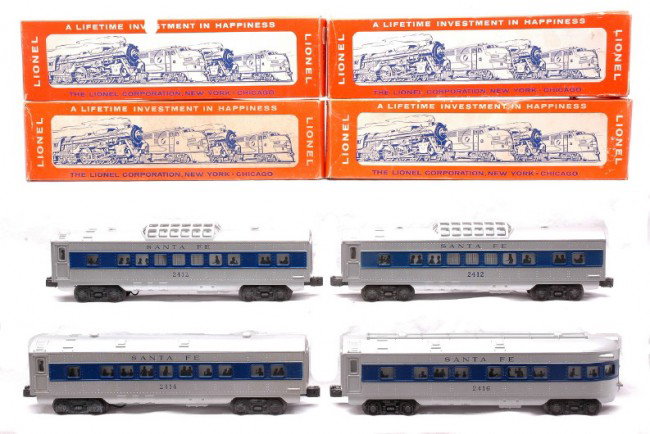 Lionel SF Pass Cars 2414 2412 2412 2416 OBs: Lionel postwar silver Santa Fe passenger cars with blue stripes; 2414 Pullman, two 2412 vista domes and 2416 observation all in OBs. The silver paint on the passenger car roofs have a slight discolora