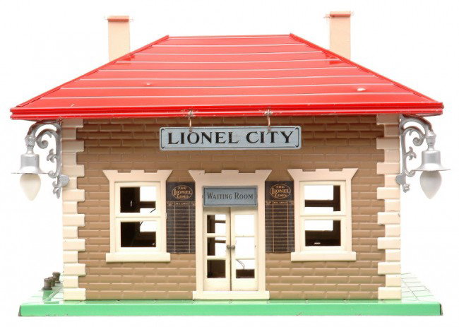 Lionel 134 Lionel City Station w/Tan Walls: Lionel prewar 134 Lionel City station with green base, tan walls, red roof, ivory widow frames and trim, white doors and window inserts, nickel signs and aluminum painted light fixtures. The roof and 