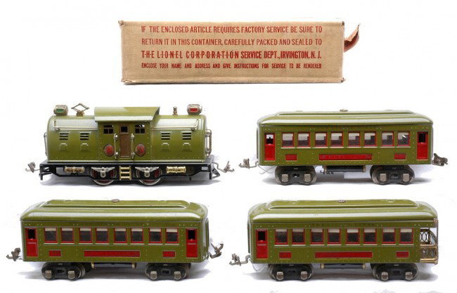 Lionel Prewar Olive Green Passenger Set no. 266E: Lionel prewar O gauge olive green passenger set no. 266E containing; 254E electric 0-4-0 loco in OB, two 610 Pullmans and a 612 observation. The cars have red inserts and nickel journals. The wheels o